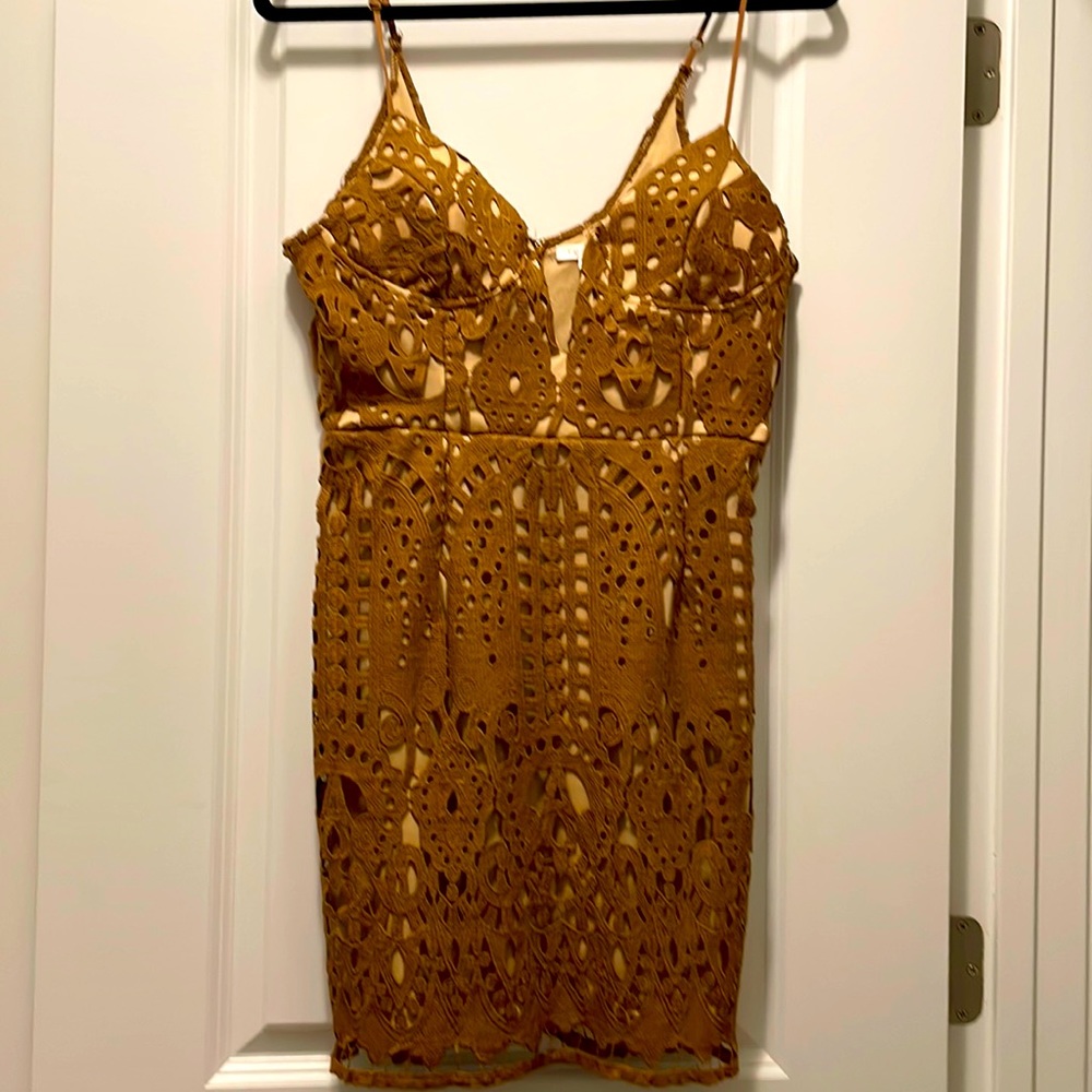 Lace dress with nude underlay